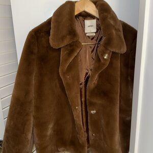 Brown shearling jacket. Looks new. No signs of wear